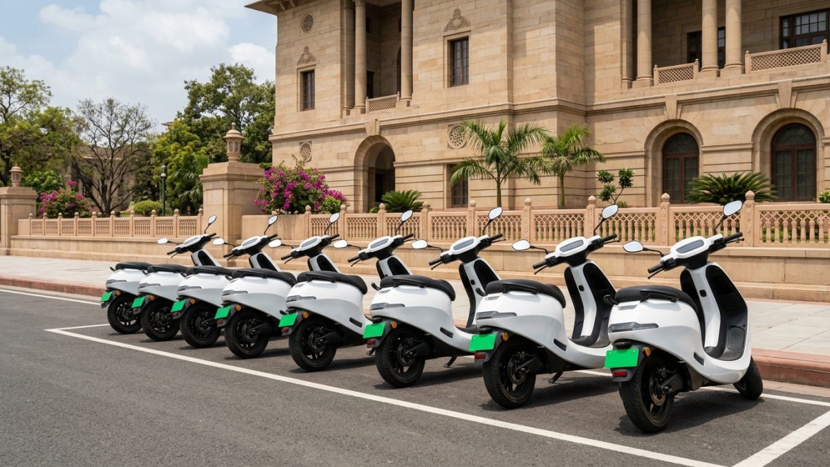Electric two-wheelers parked neatly outside a regional transport office in India