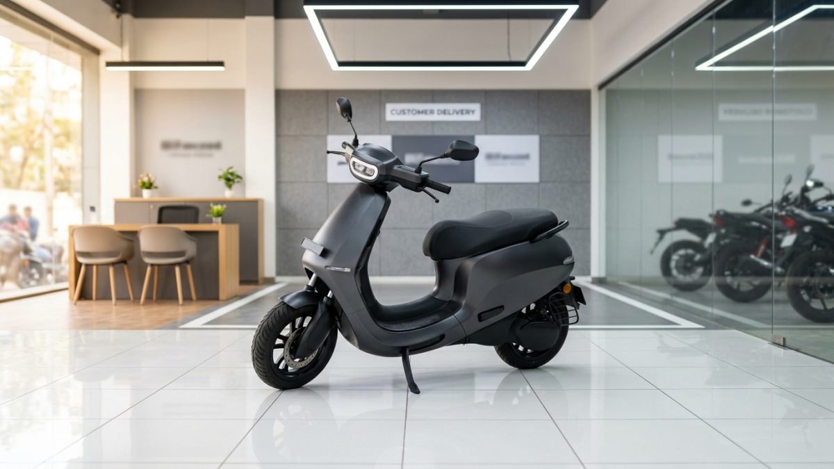 Newly delivered scooter with high security number plate in a bright showroom bay
