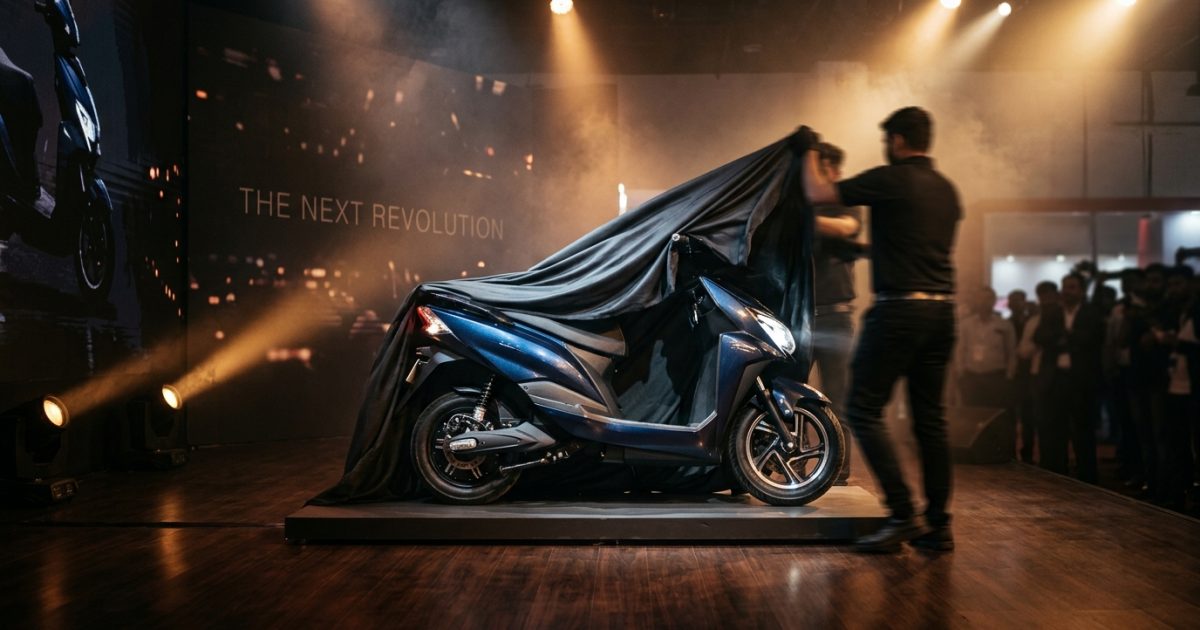 Covered upcoming electric scooters in india unveiled on a stage under spotlights