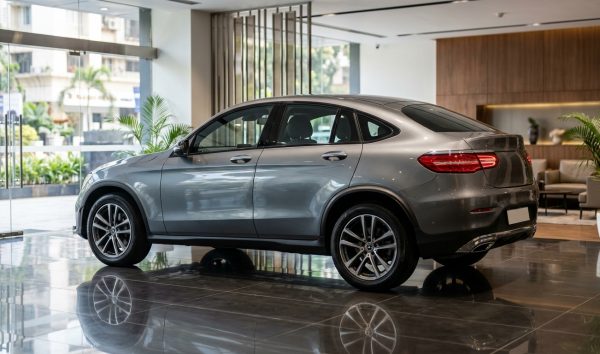 Showroom display featuring a new car launch in India with modern studio illumination